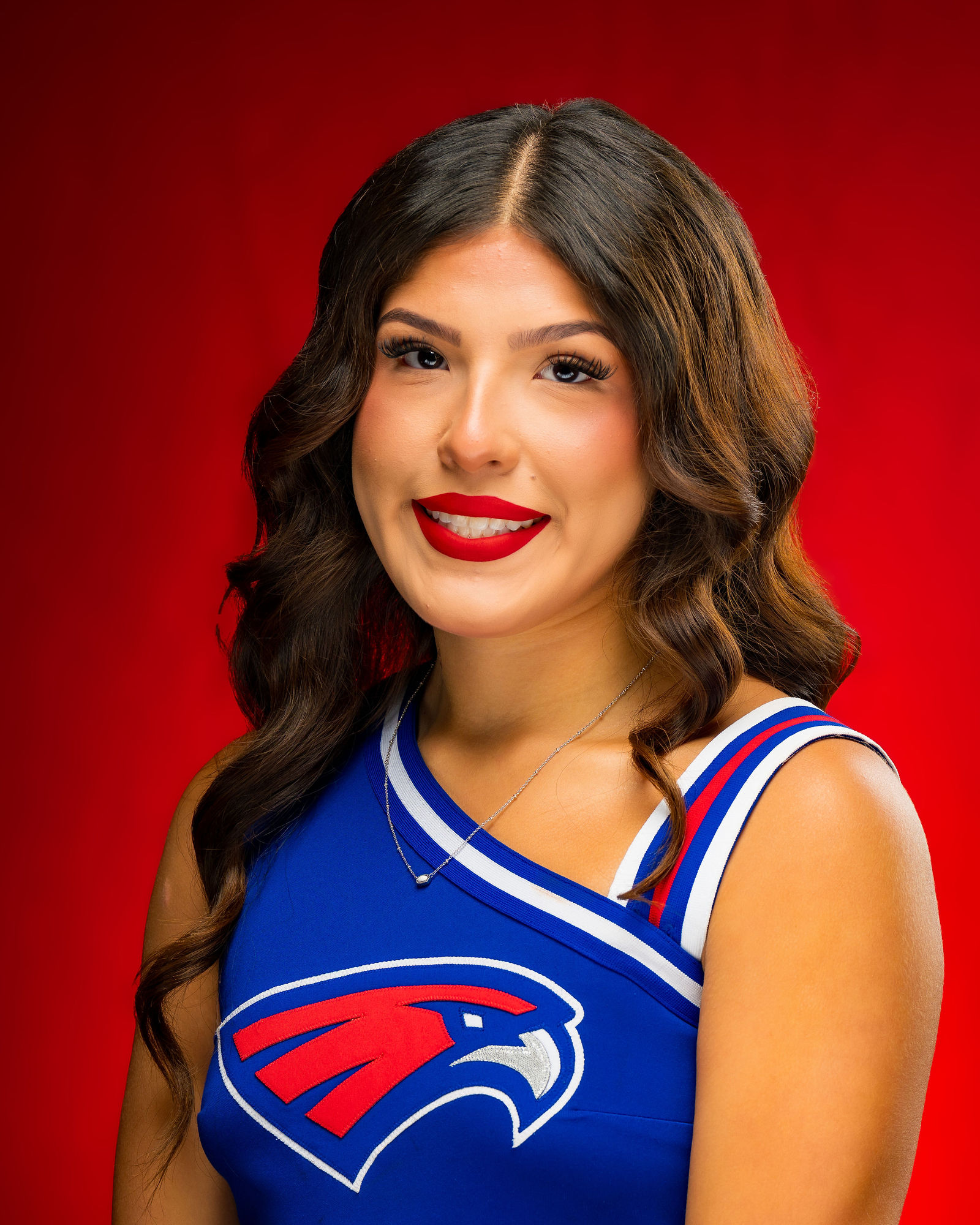 Professional cheer headshot for Hays Hawks football program in Central Texas
