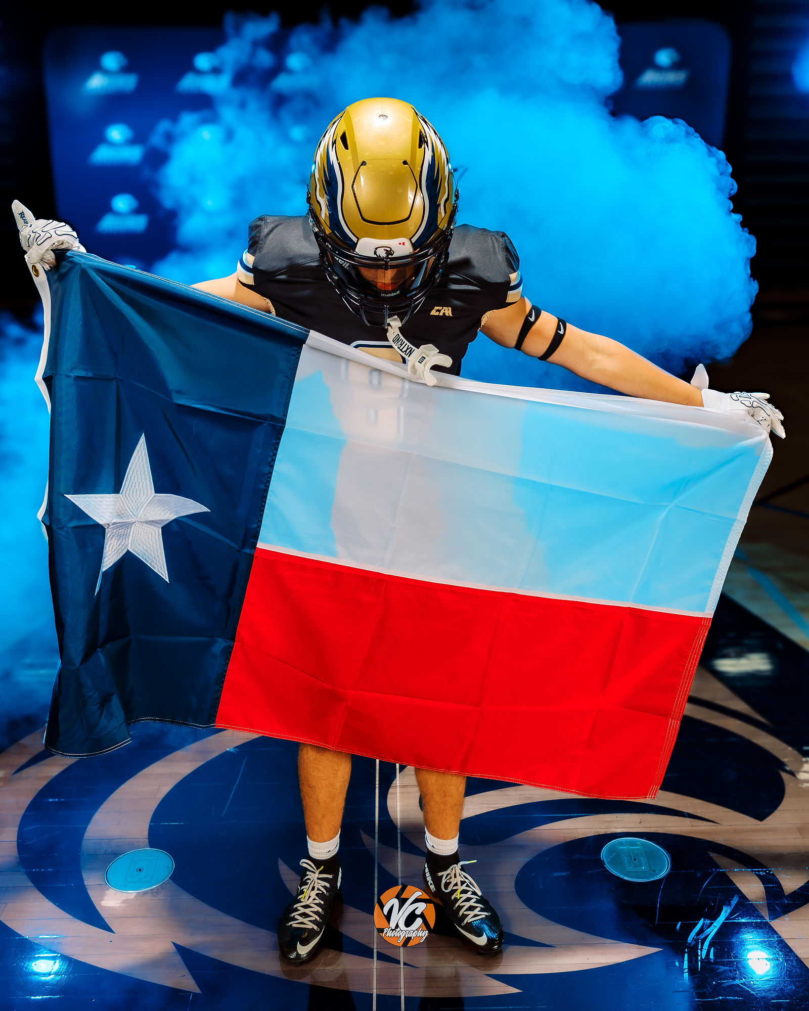Akins Eagles varsity football portrait photographed during an indoor media day at Akins High School in Austin
