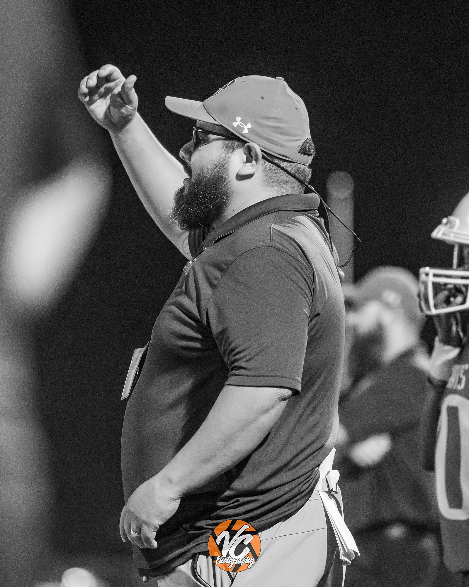 Barton Bobcats middle school football coach directing players from the sideline during the Dahlstrom game