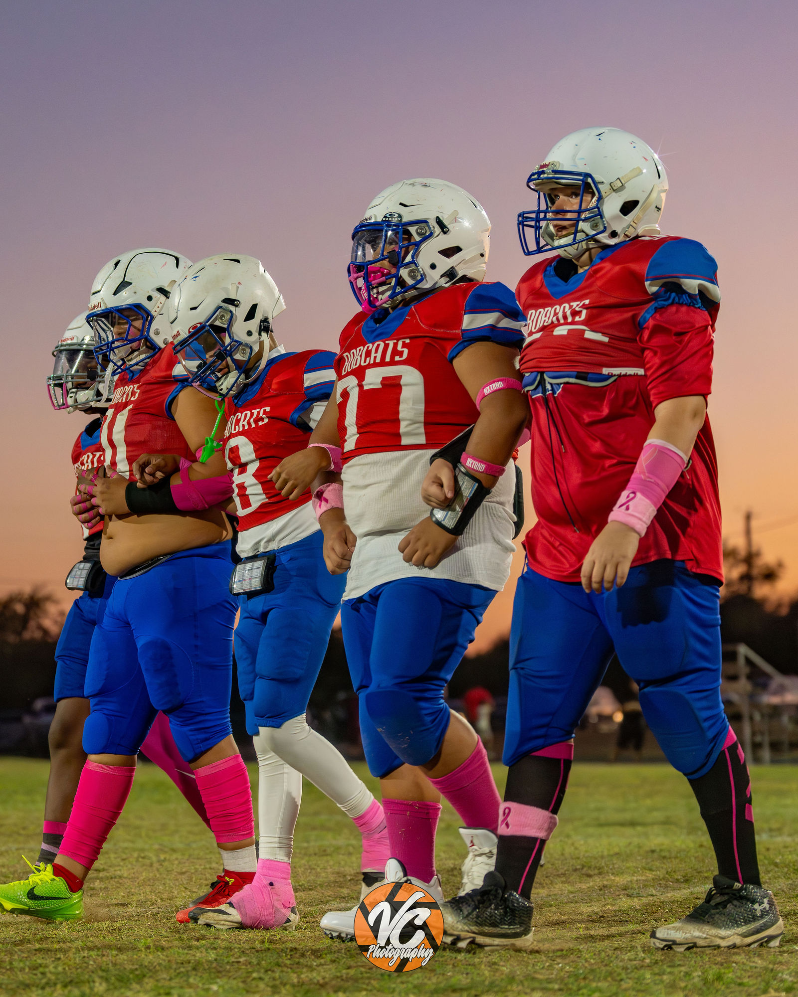 Barton Middle School Bobcats football player driving through contact during a game against Dahlstrom Middle School in Buda Texas