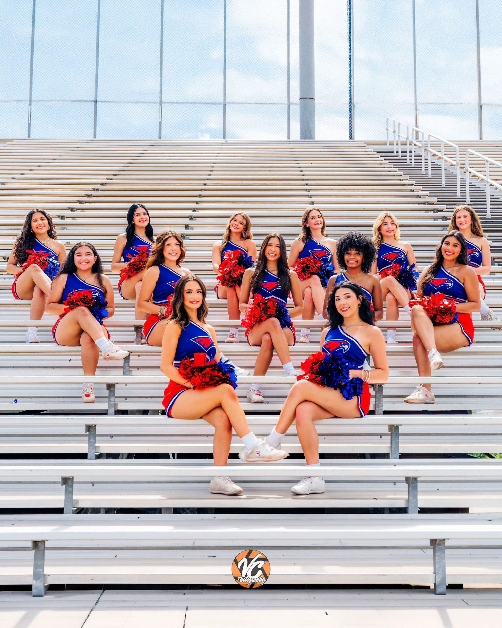 Senior cheerleader from Hays High School featured in a polished cinematic graduation portrait
