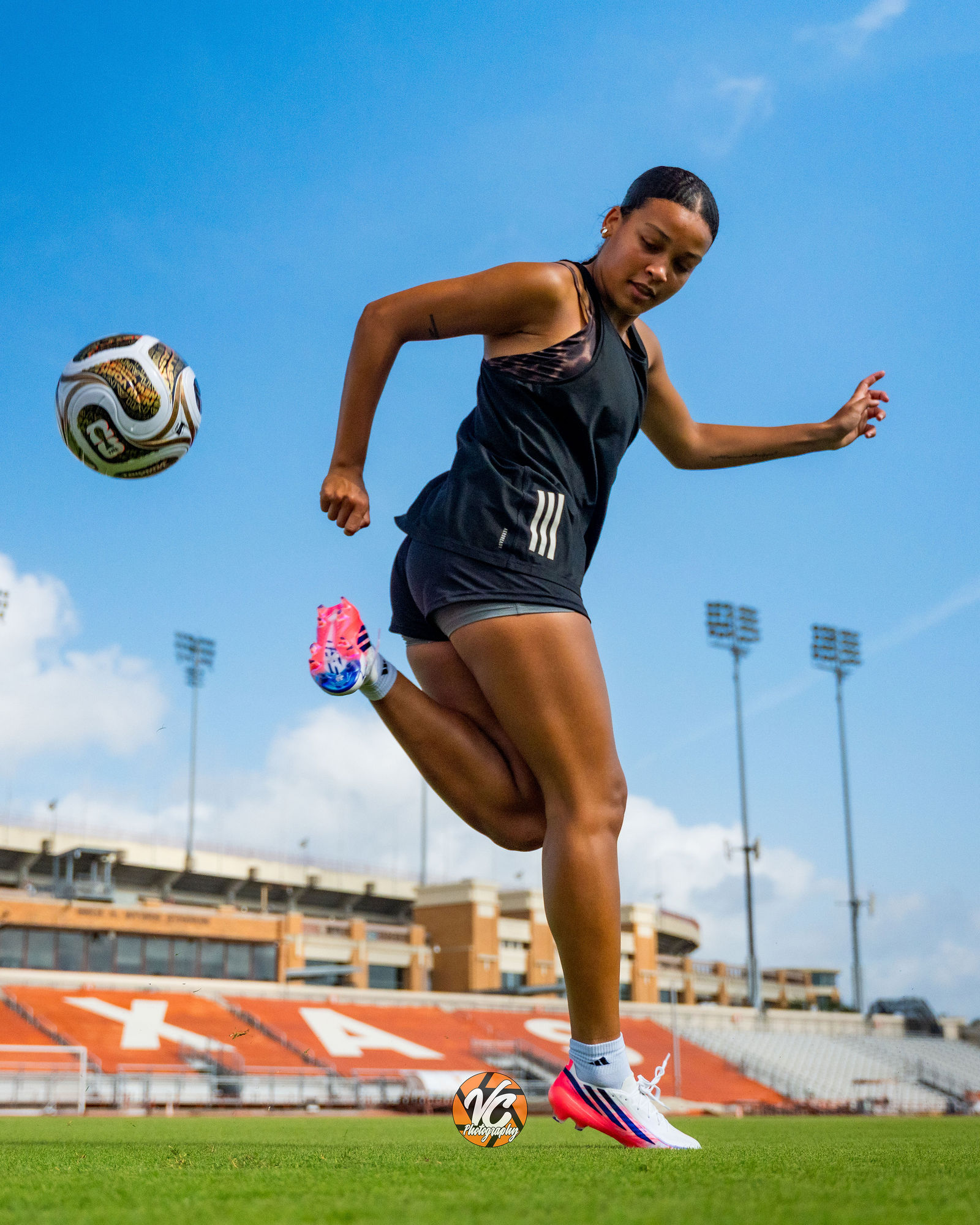 Ashlyn Anderson creating high-energy soccer athlete branding content at the University of Texas stadium in Austin