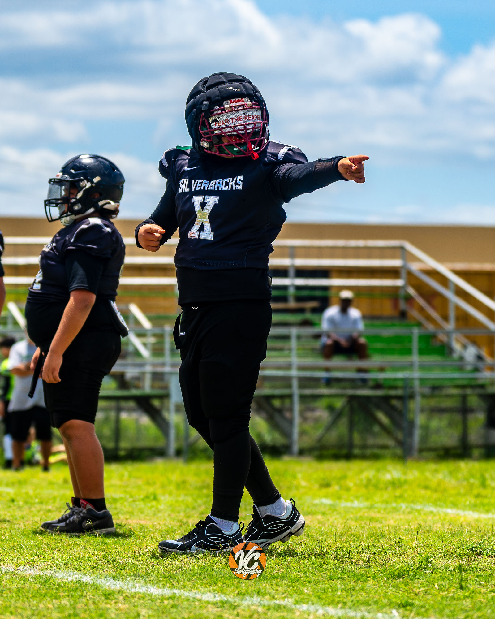 SilverBacks football player captured in peak game movement during championship coverage