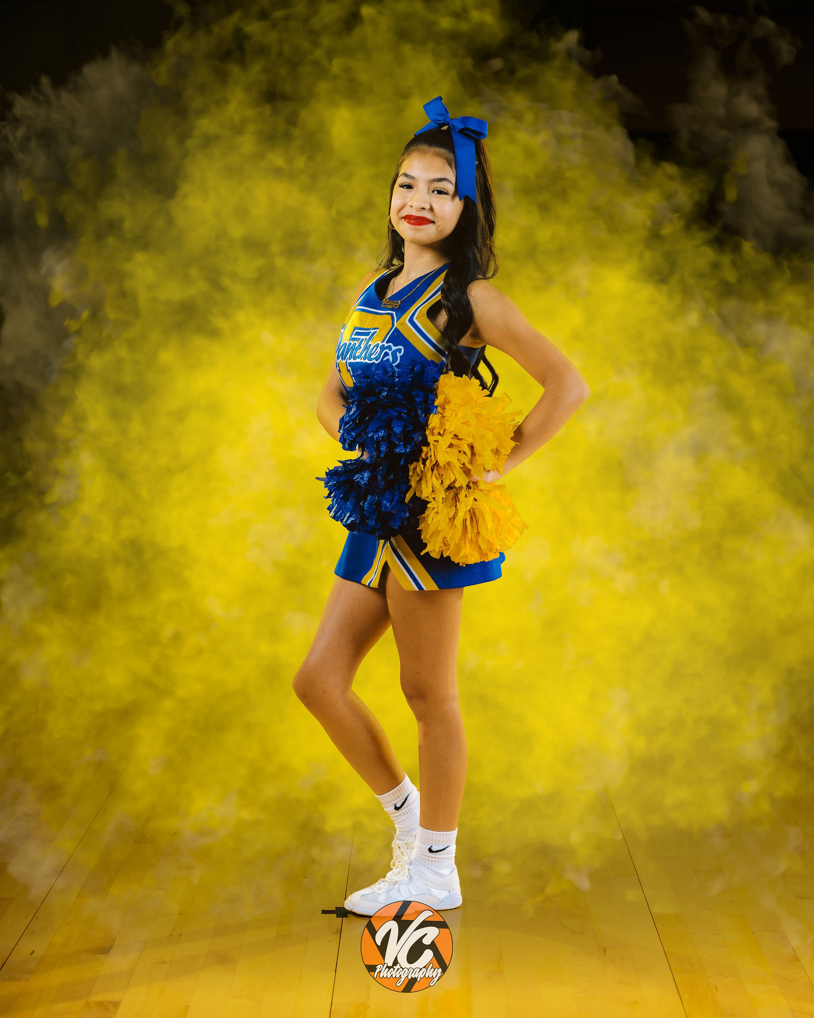 Cinematic cheer portrait for Pflugerville High School by VC Photography