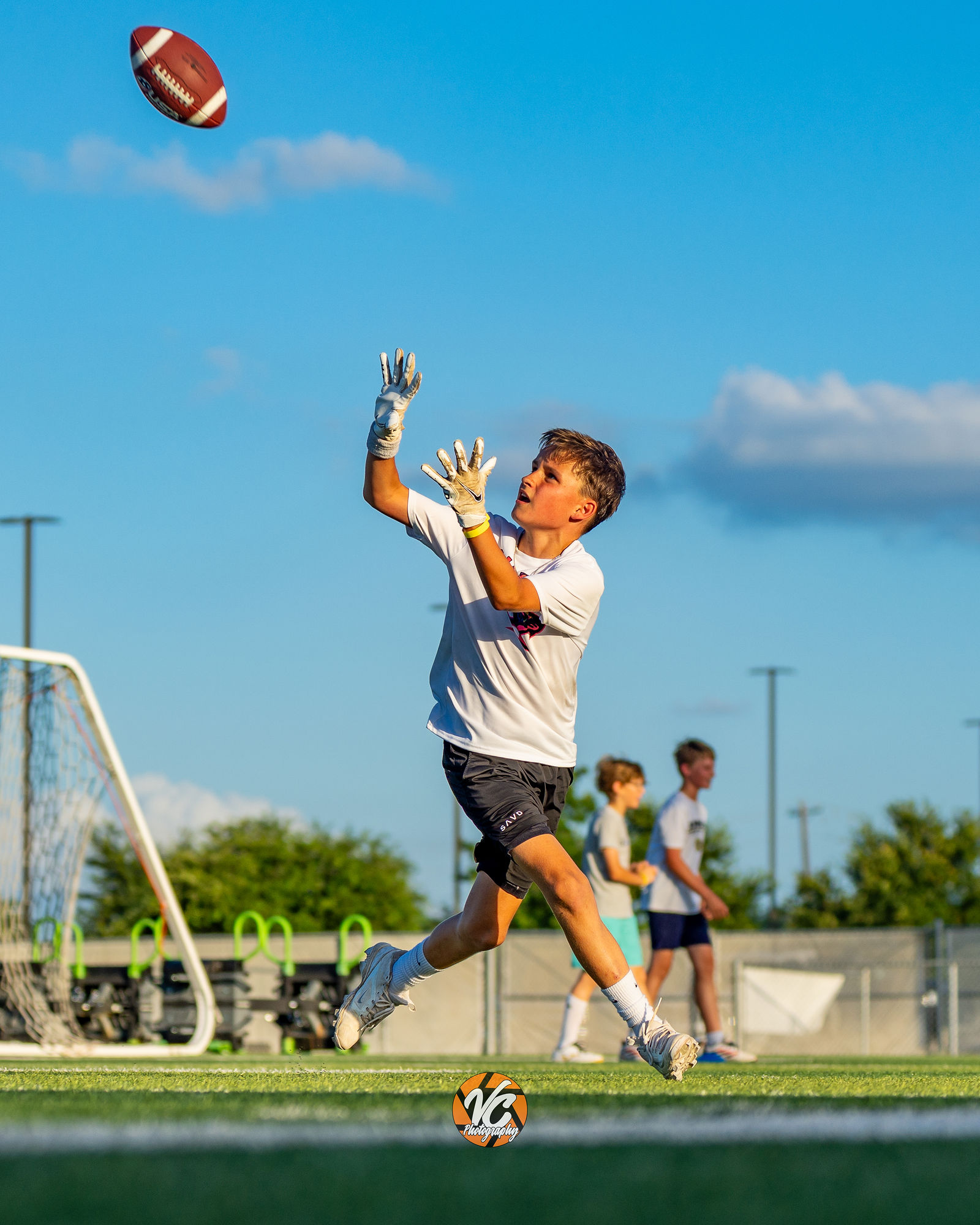 Buda youth football action photography with strong sideline storytelling