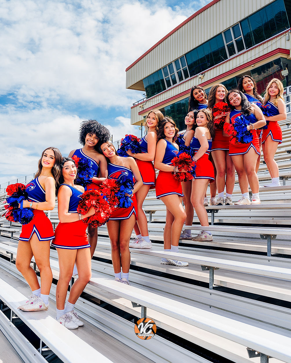 Hays High School cheer senior posing in uniform for a modern Central Texas senior portrait