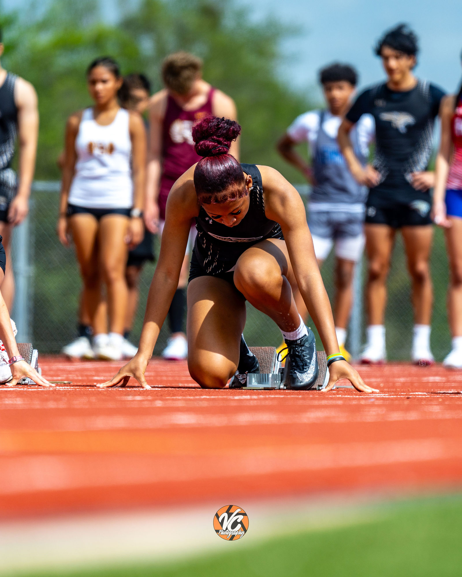 High school track action photography at Johnson Football Fields