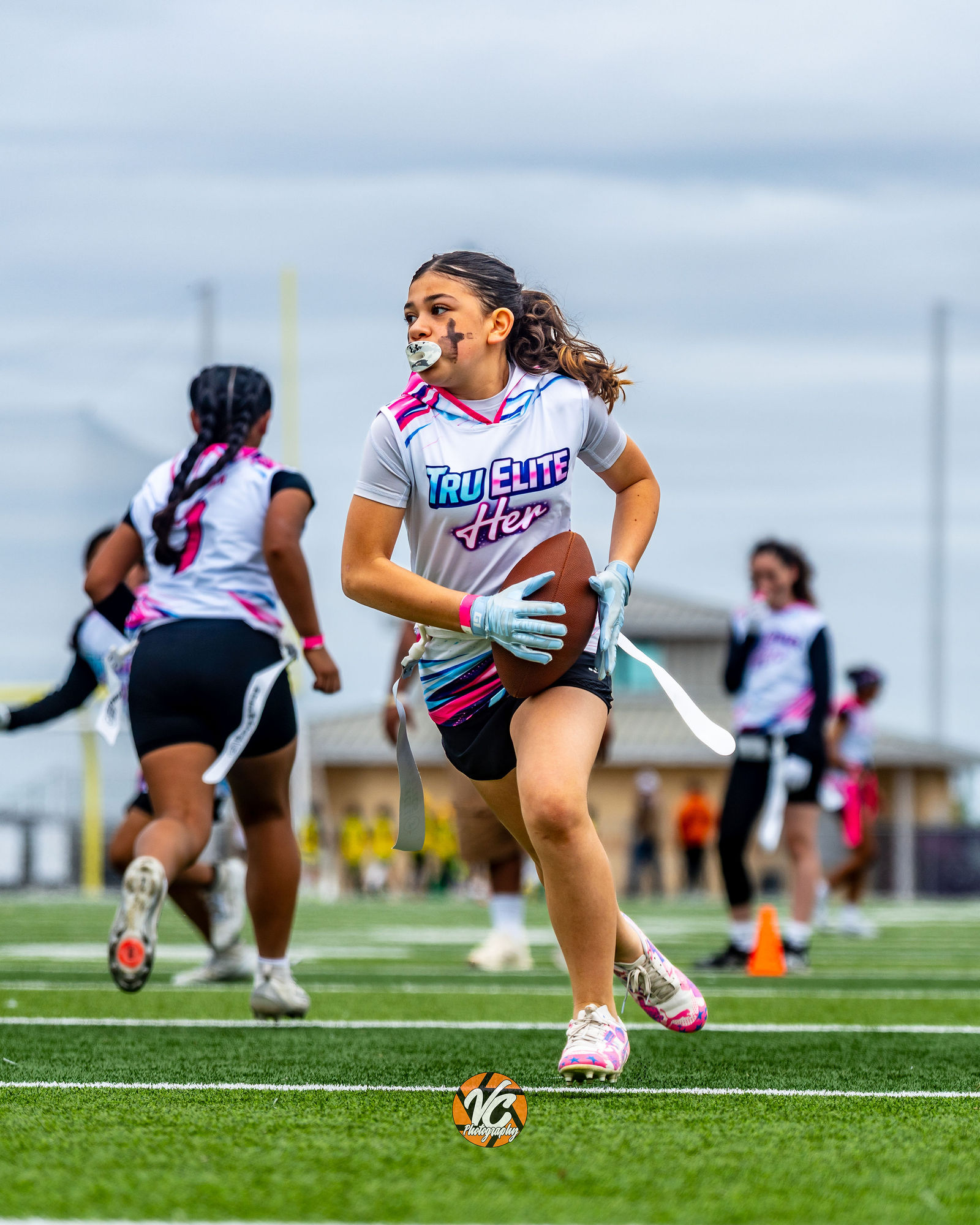 San Marcos 7v7 football team action photo by VC Photography