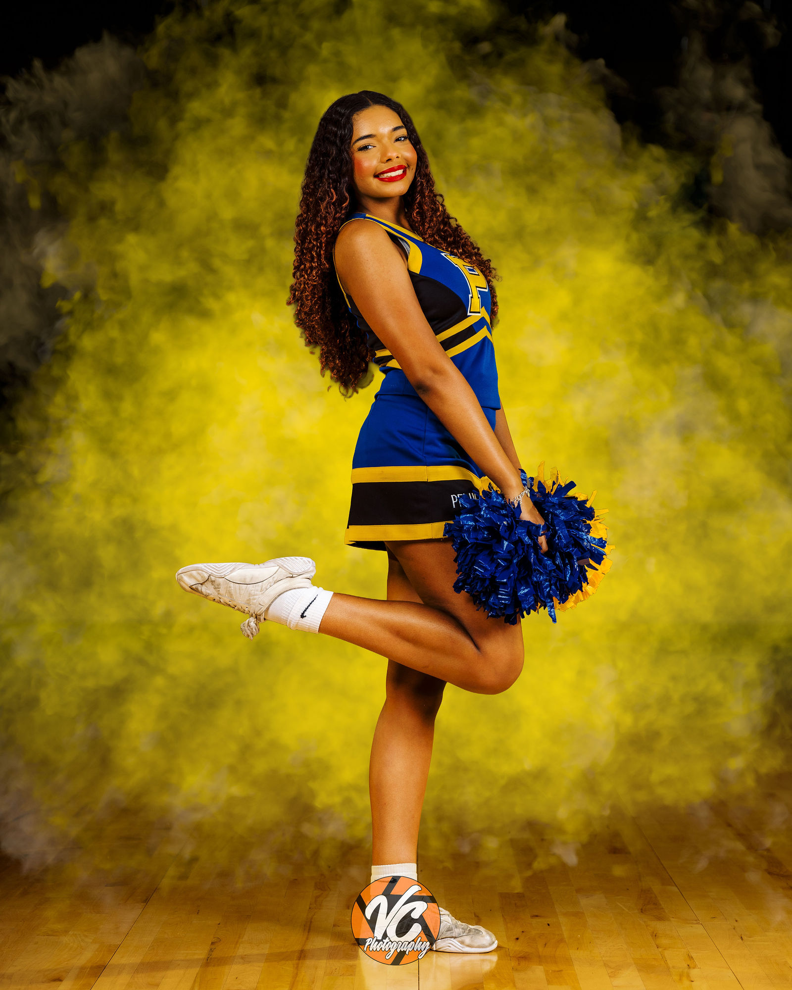 Pflugerville cheerleader portrait with cinematic athlete branding style