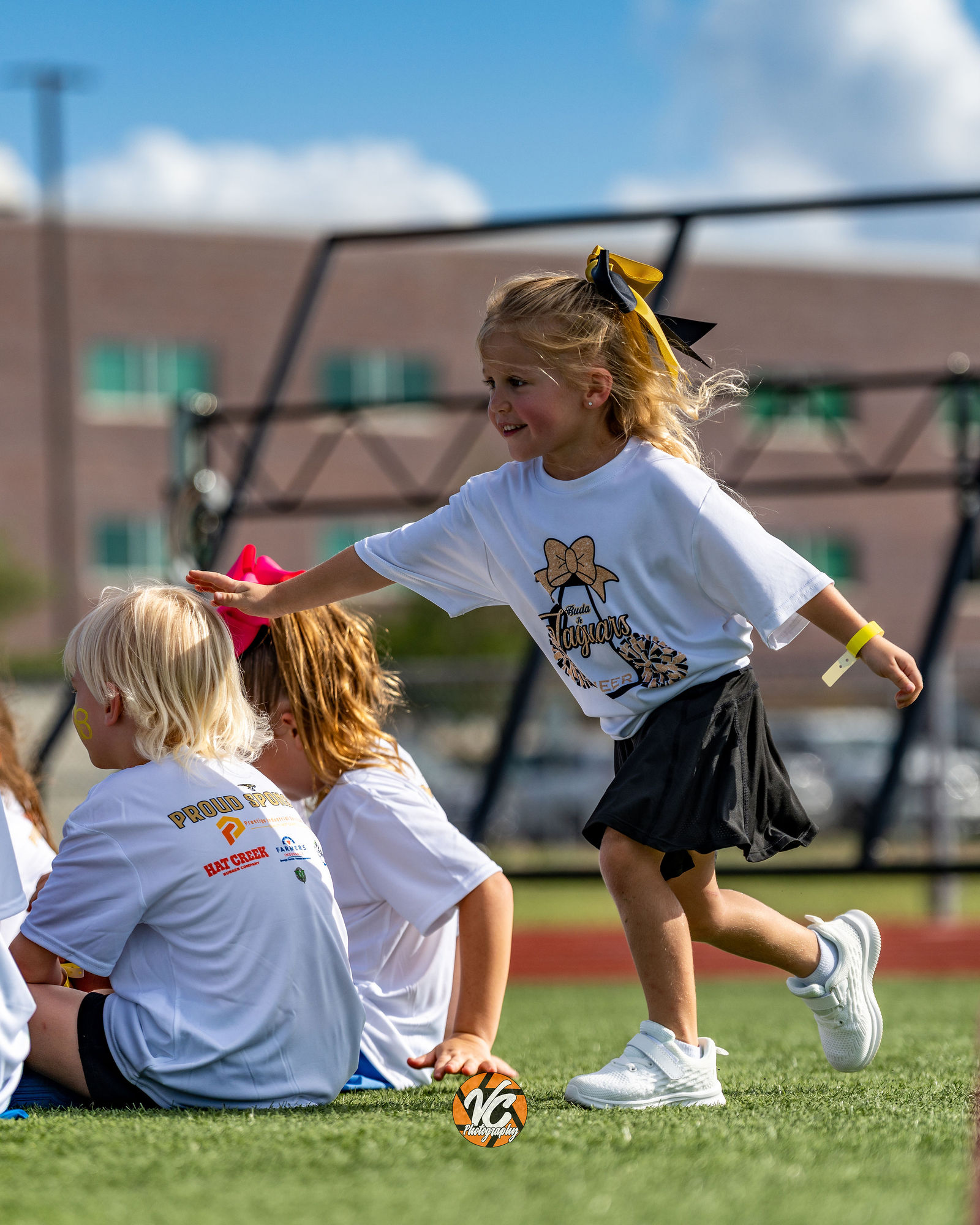 Buda youth football camp action photo by Austin sports photographer VC Photography
