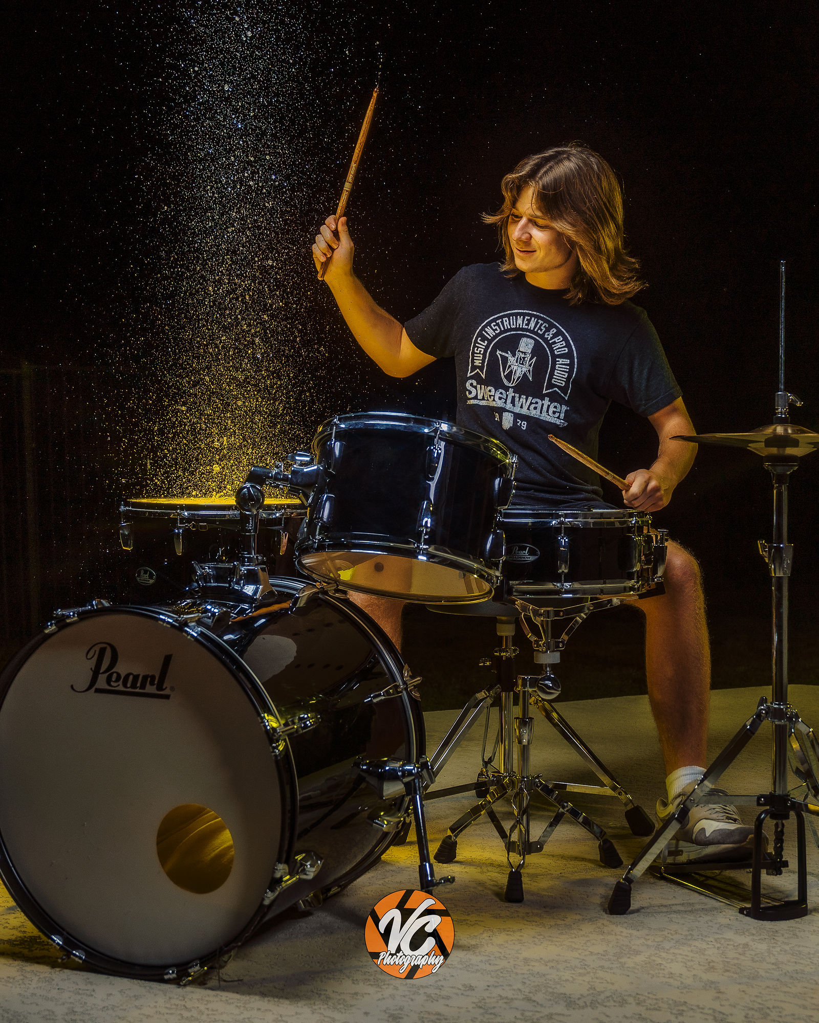 Dramatic Johnson High School musician portrait featuring Chase Urbanovsky with smoke and cinematic lighting