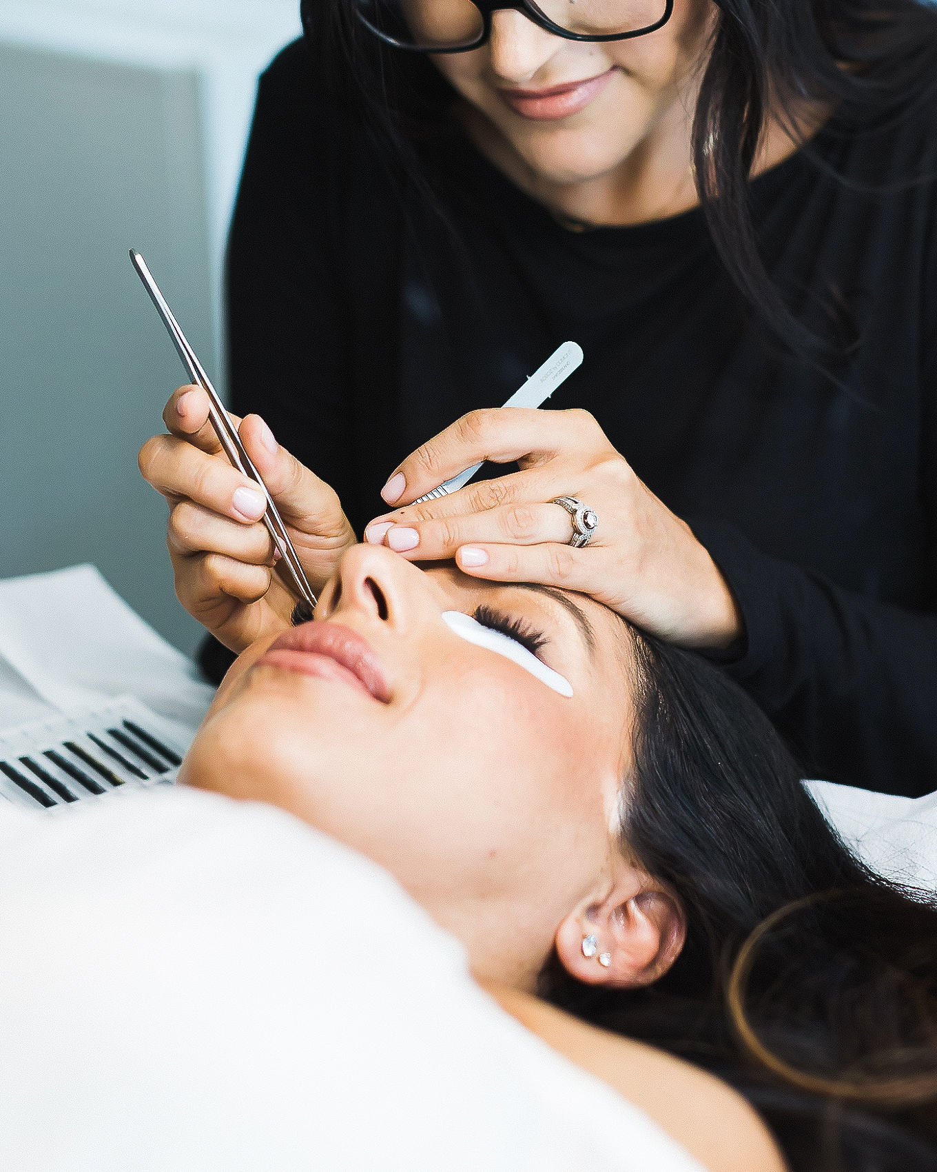 Esthetician client treatment, beauty brand photography