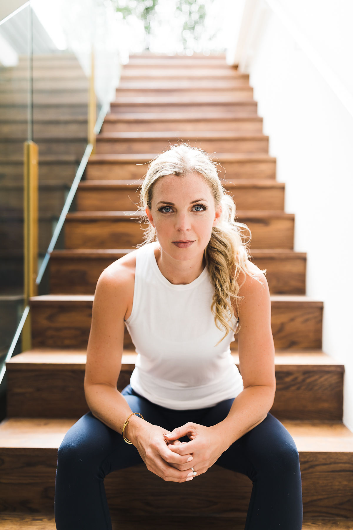 Founder brand portrait, wooden stairs, Katie Monroe Brand Photography