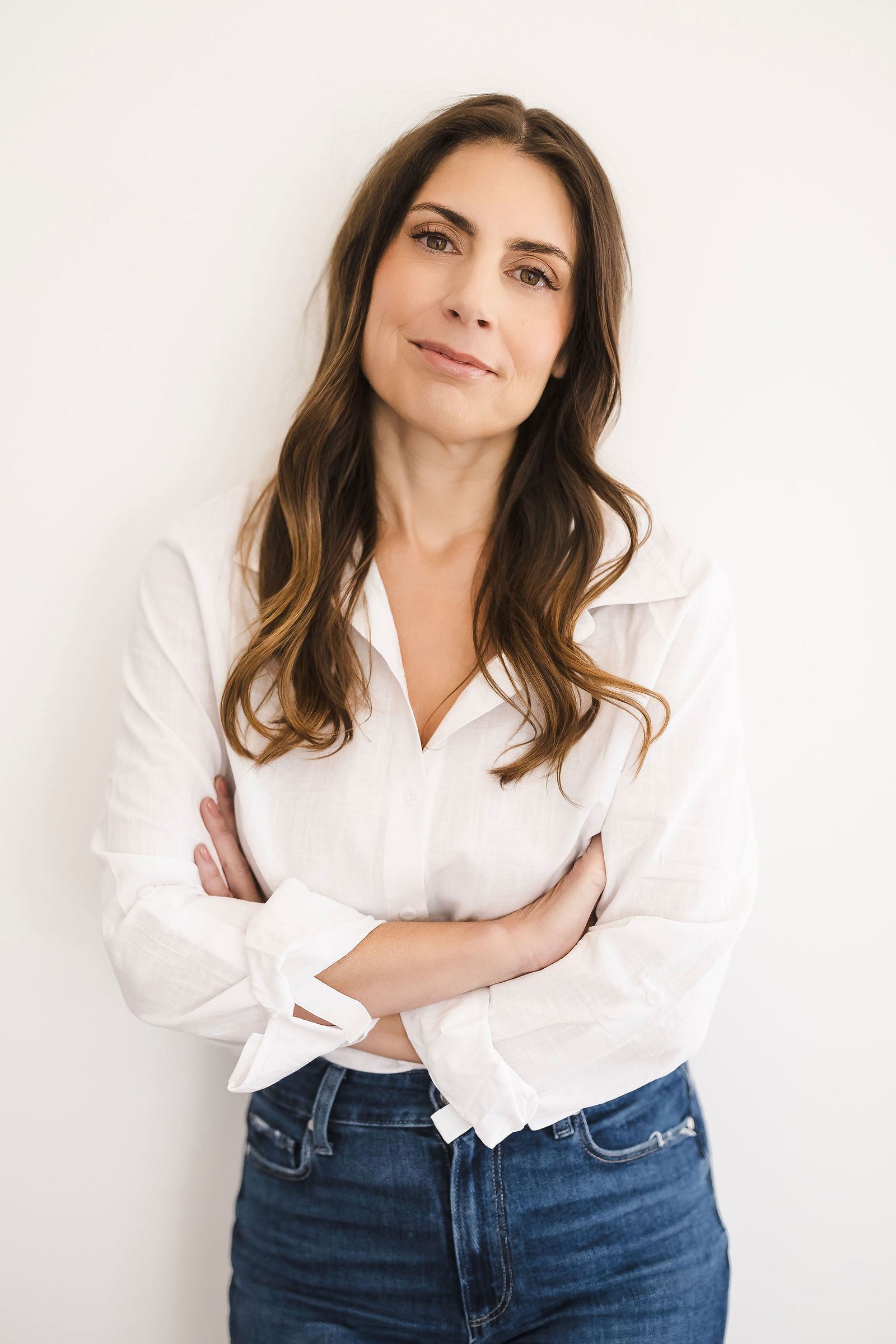 Artsy brand portrait, arms crossed