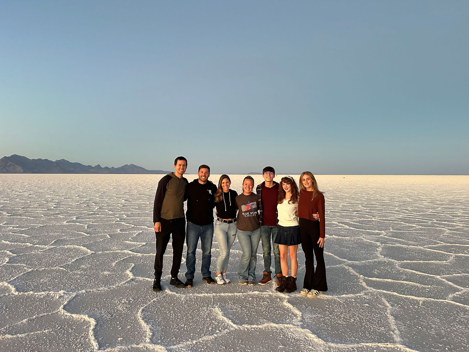 Group photo with Nathan, his girlfriend, and their families at the Bonneville Salt Flats in Utah