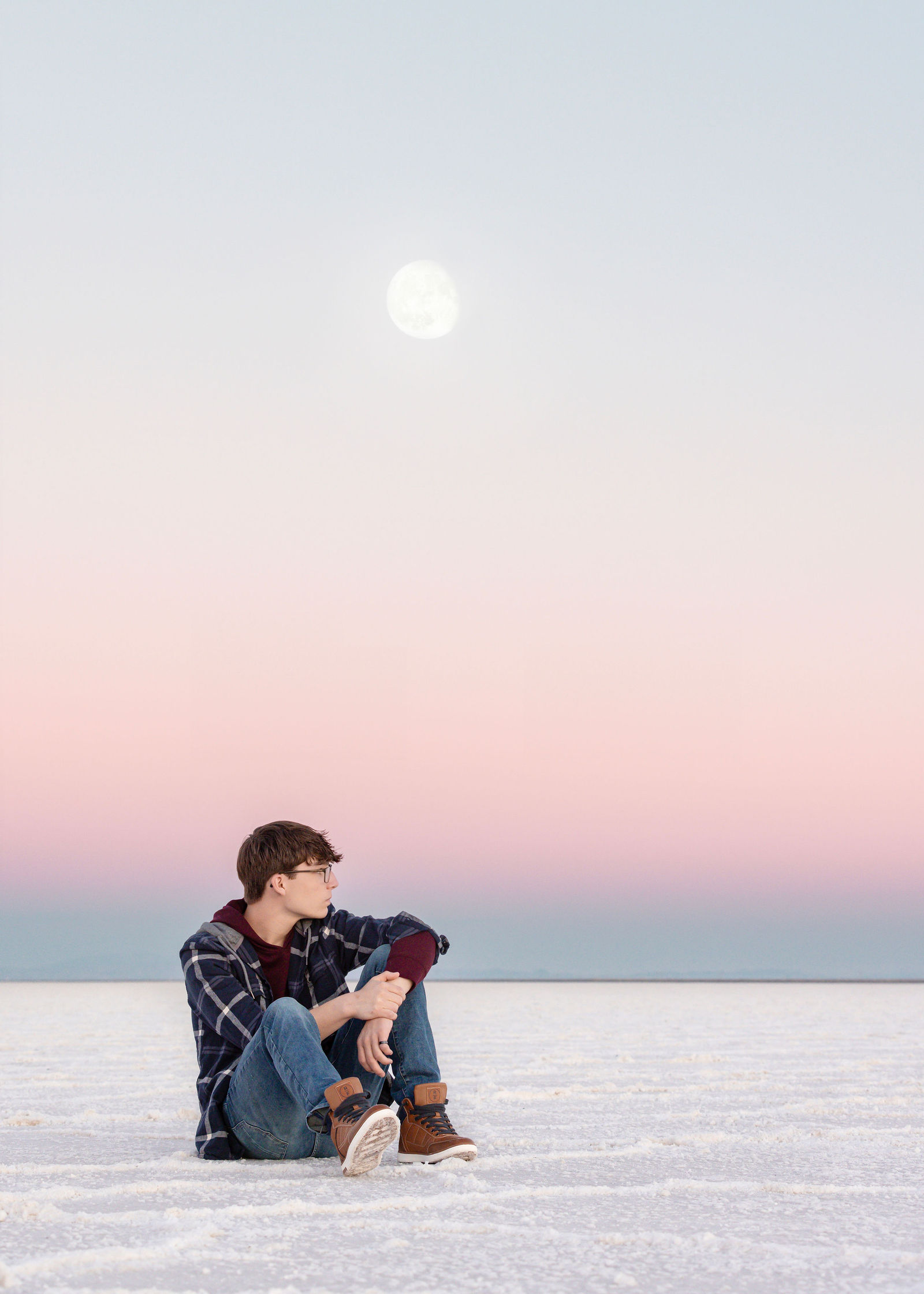Nathan senior portrait at Bonneville Salt Flats with soft evening light