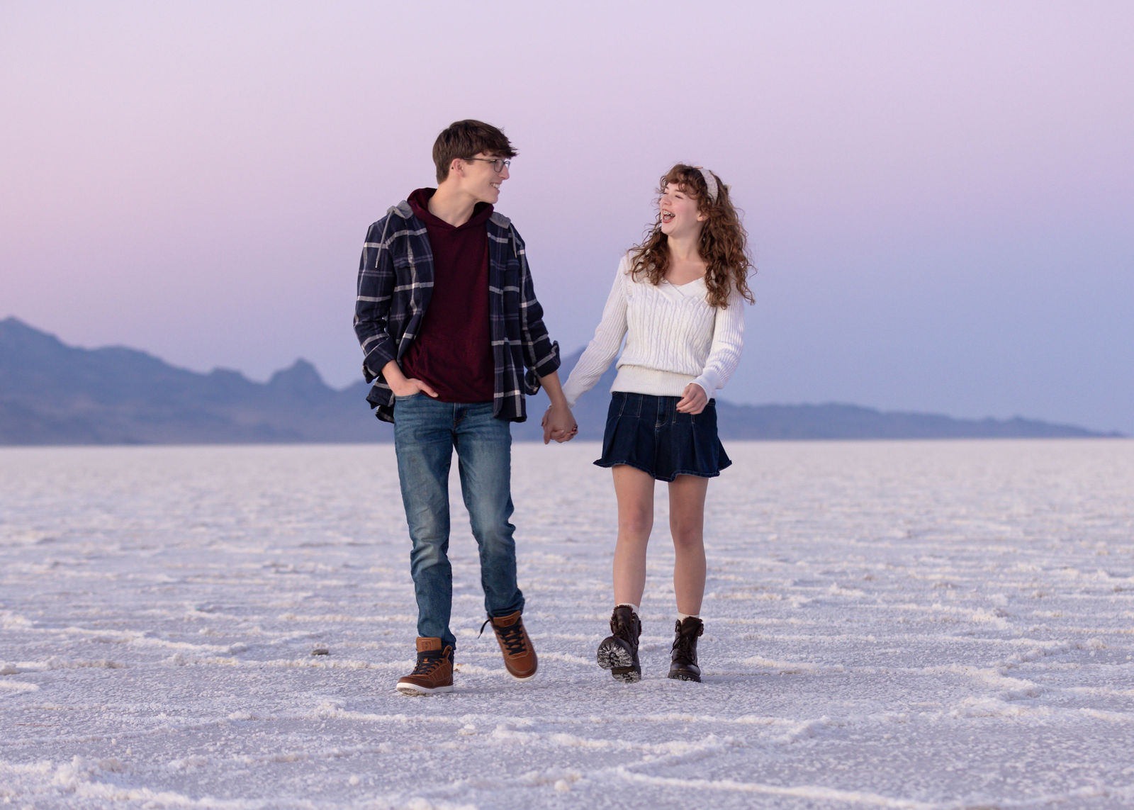 Nathan and his girlfriend posing together at the Bonneville Salt Flats during senior photos
