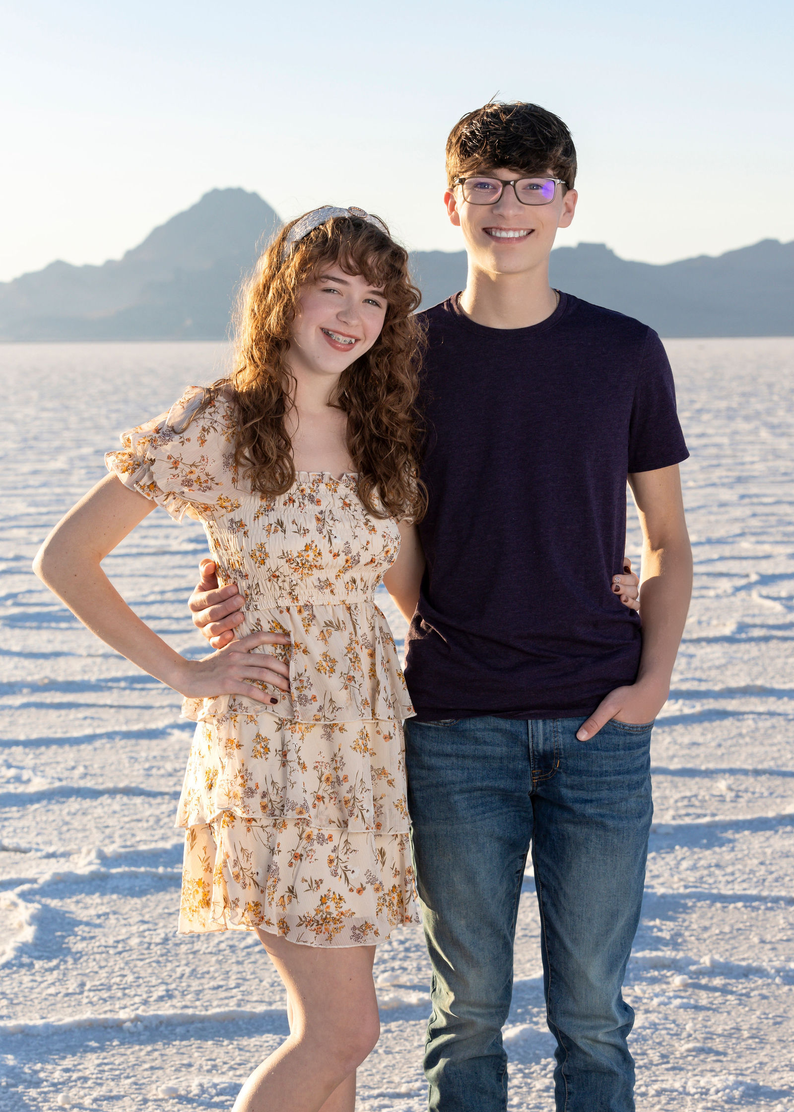 Nathan and his girlfriend smiling during Salt Flats senior session in Utah