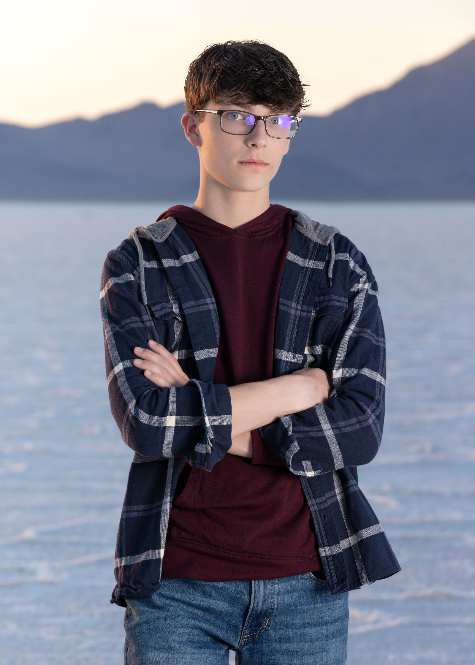 Nathan senior photo at Bonneville Salt Flats with dramatic horizon and clean true-to-color editing