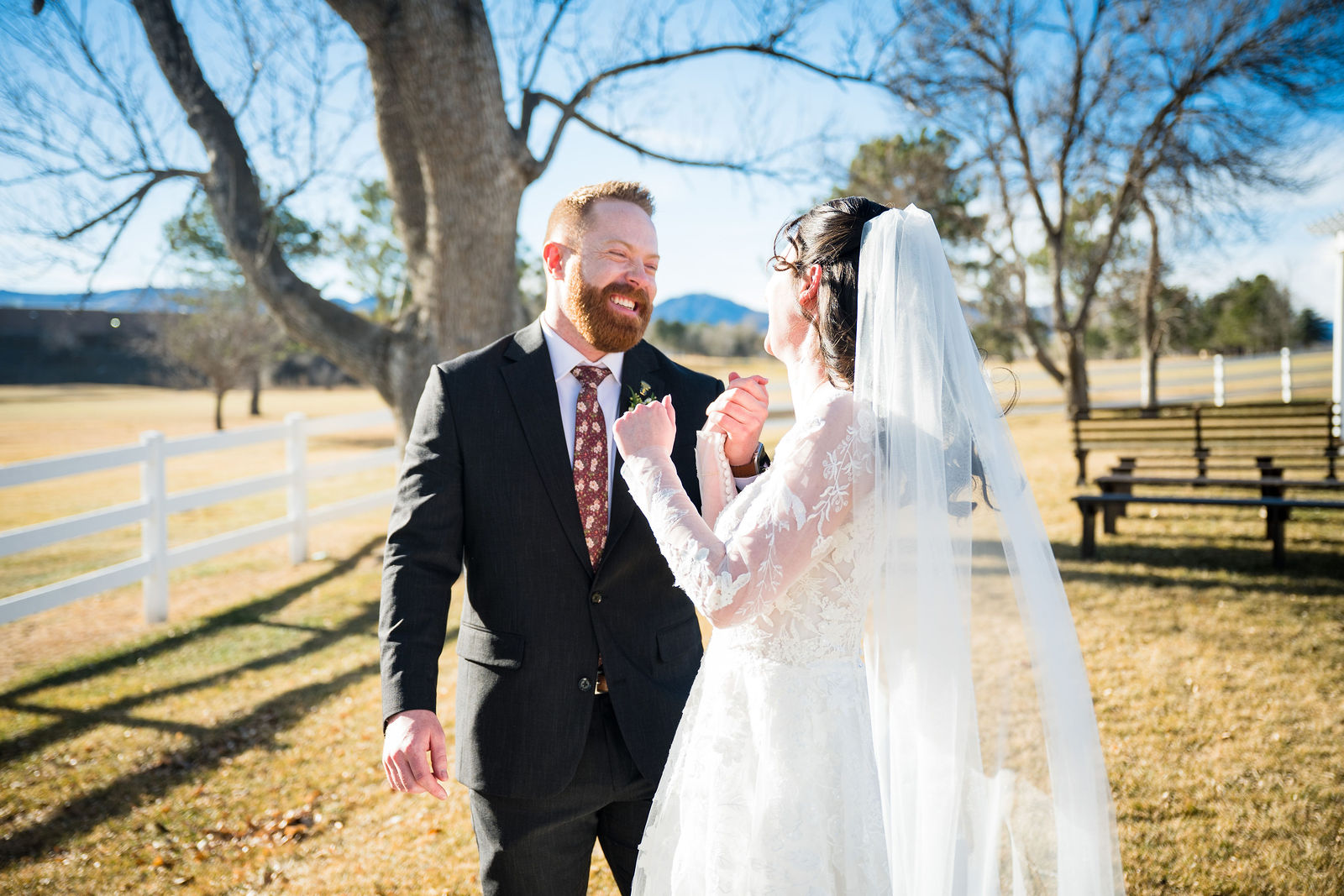 Bride and groom walking together at a Colorado wedding