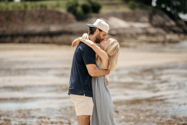 A couple embraces at their wedding celebration photographed by Love in Focus Studio