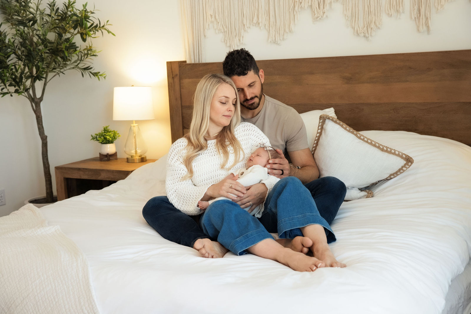 Salt Lake City in-home newborn photographer capturing baby-led newborn portraits in soft window light