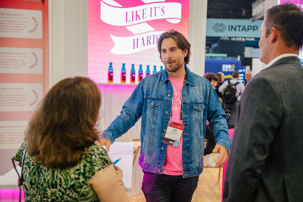 Brand video production content displayed on a digital screen at a Nashville trade show booth