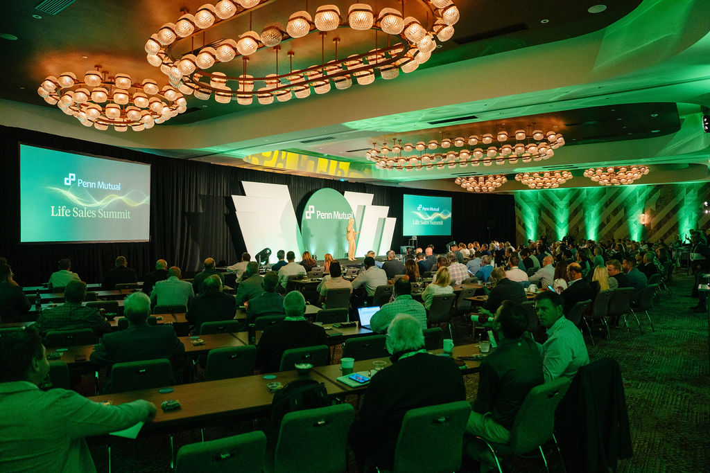 Wide shot of a full ballroom keynote covered by an event photography company