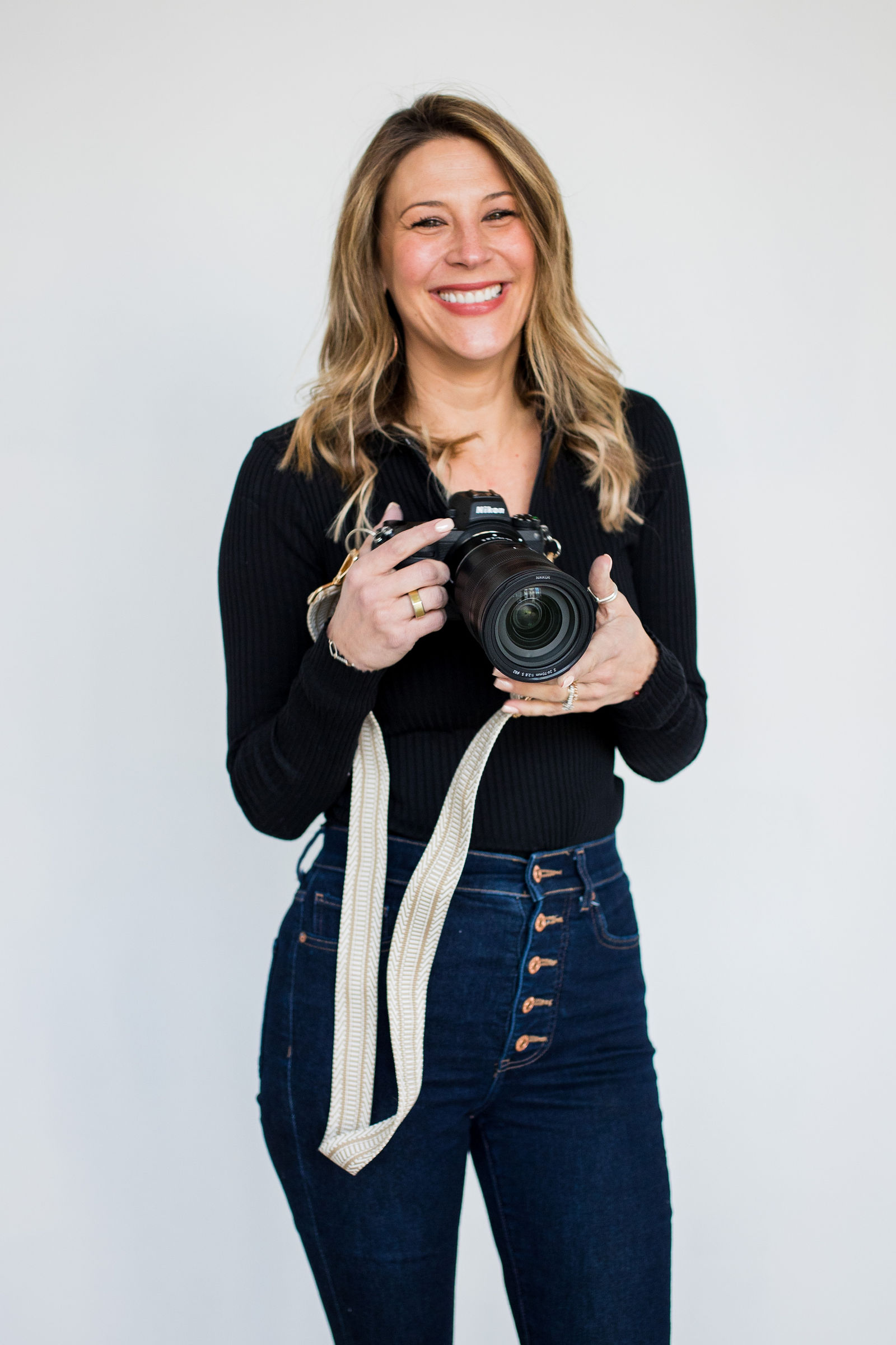 Casey Van Horn of Two One Photography with her camera
