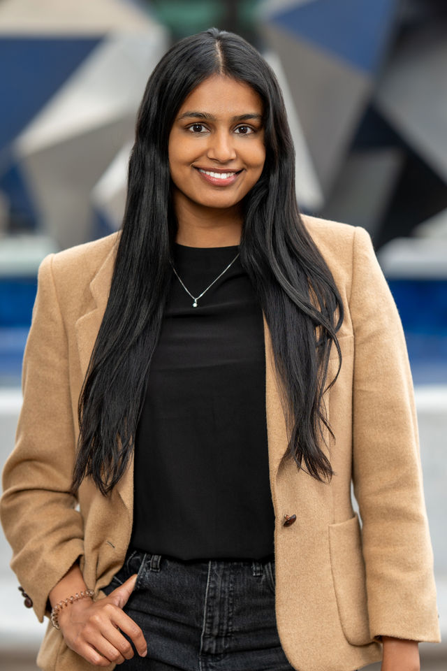 LinkedIn headshot of a woman in a tan blazer, photographed by Dodi Images