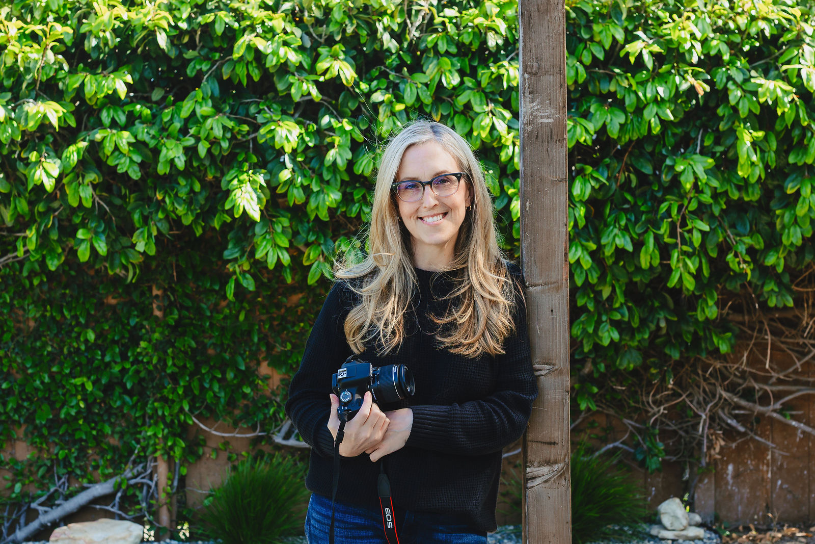Erin holding a camera