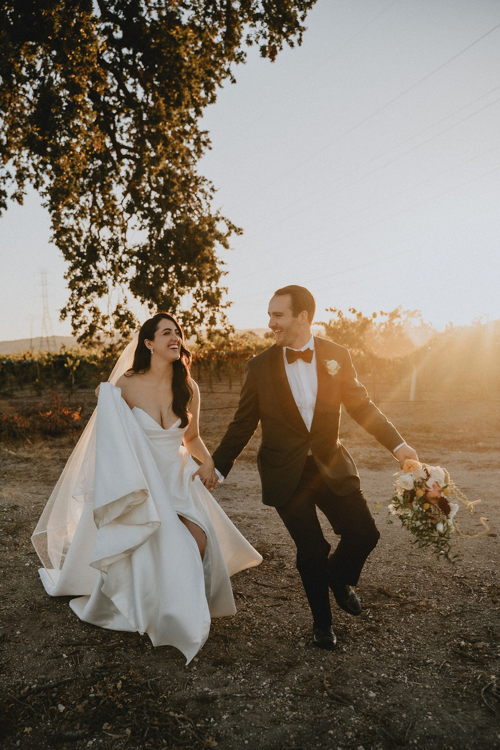 A couple walking into warm evening light