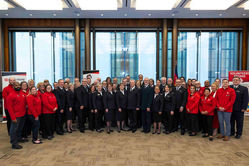 Salvation Army officers and staff together