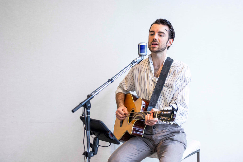 A musician playing at dinner