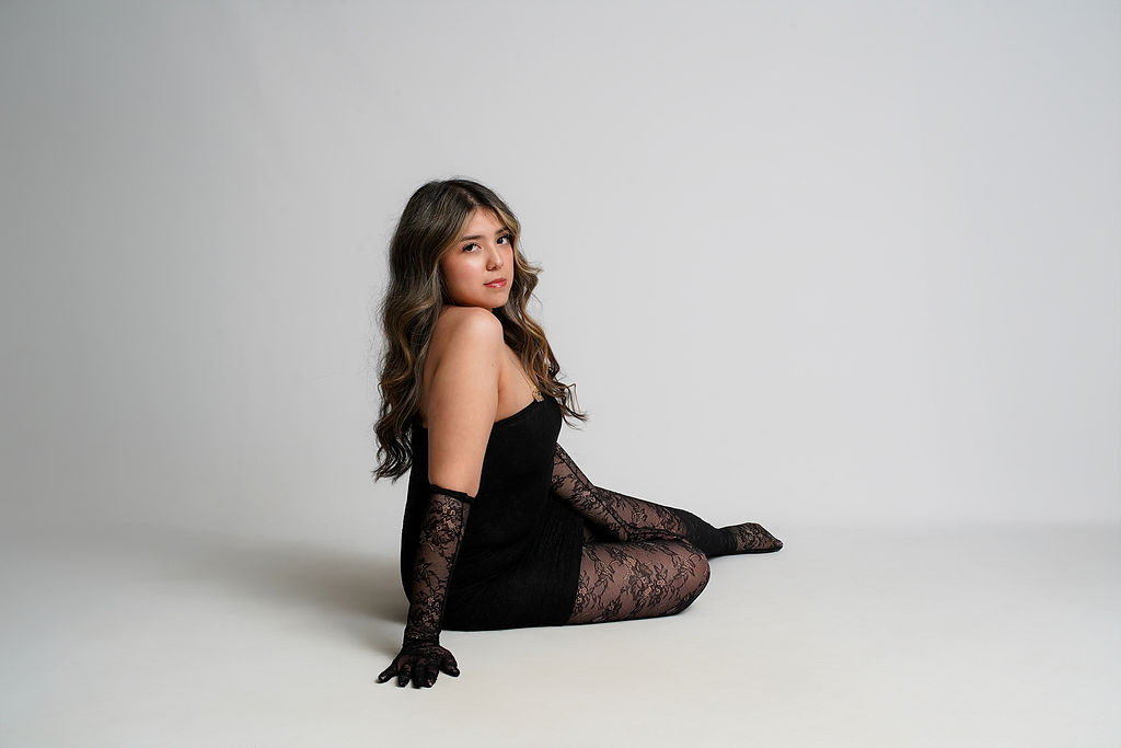 Confident full-length portrait of Keila