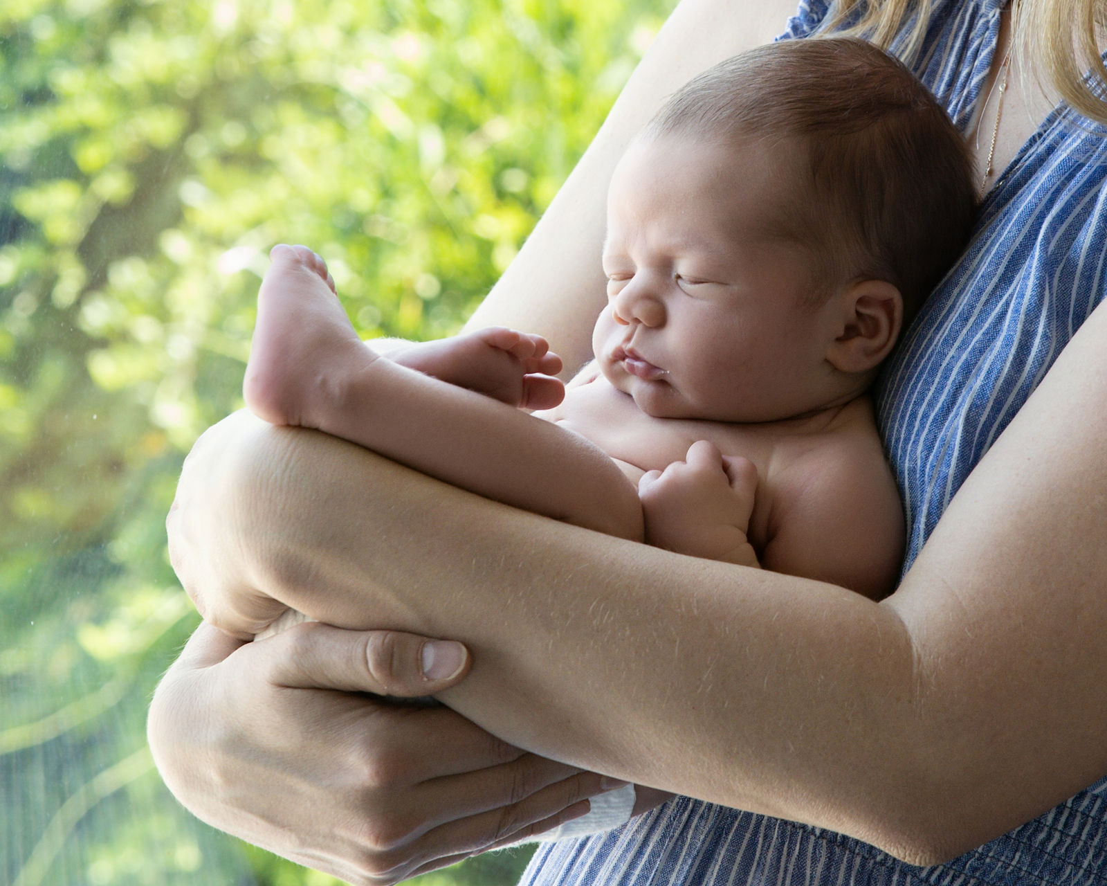 In-home newborn photography for a Davis County Utah family