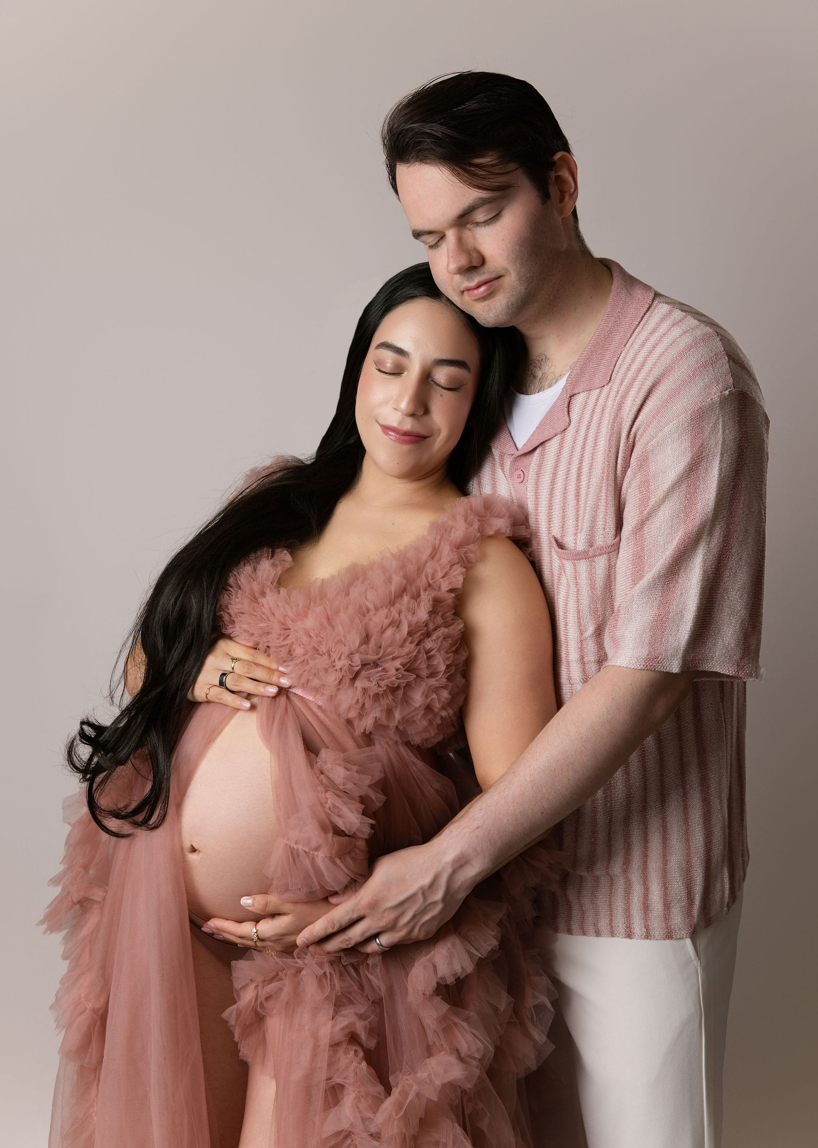 Maternity studio portraits in Layton with soft light and clean edits
