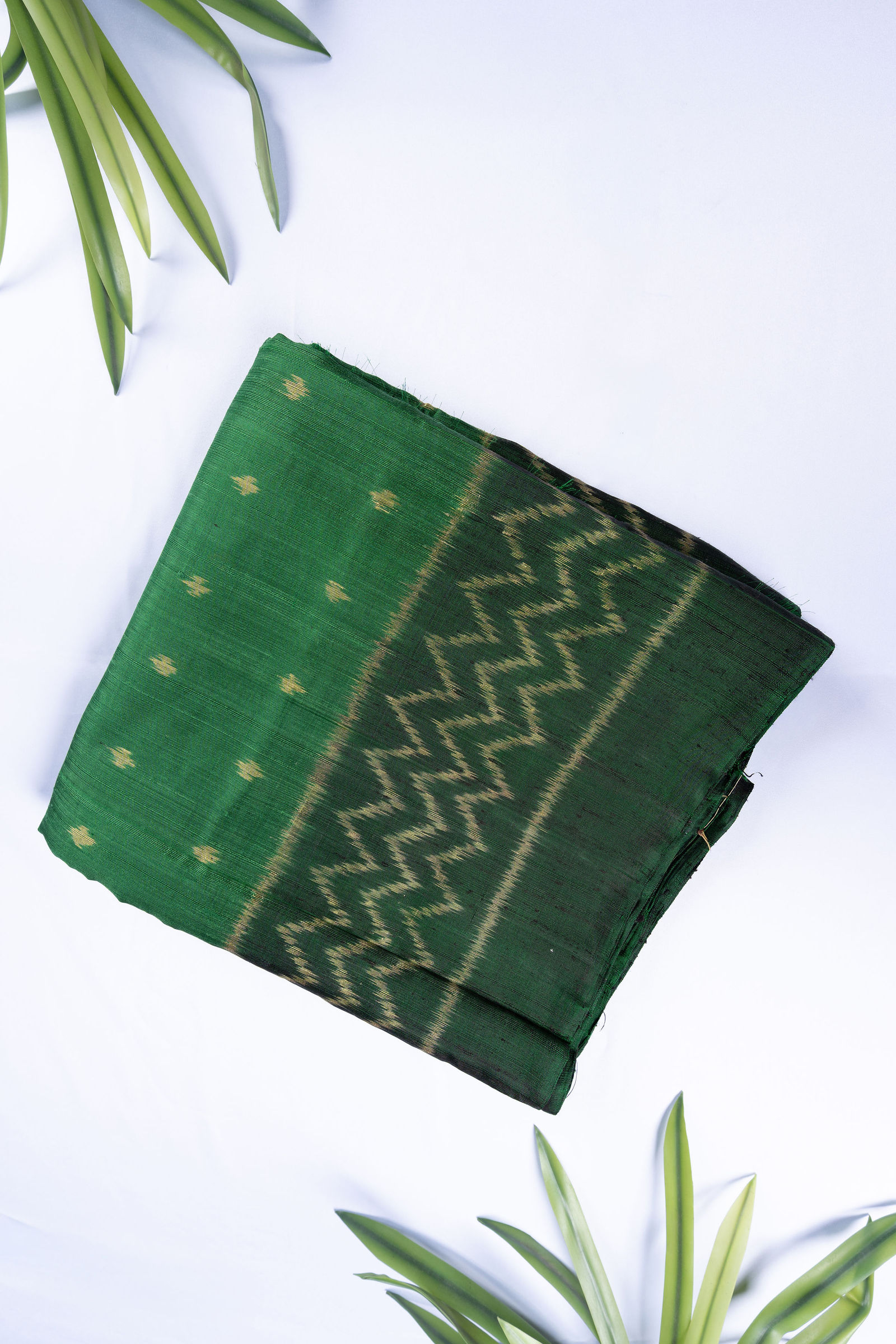 Emerald & Malachite Raw Silk Patola Chevron Saree Pure silk sarees online in India | Kandangi Sarees — Handpicked Sarees