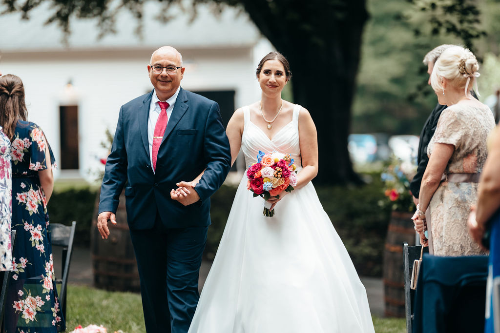 Bride walking down the aisle with her father