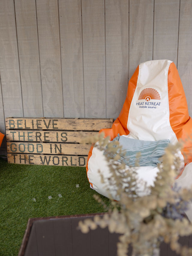 Heat Retreat beanbag chair set up in the premium party lounge on artificial turf