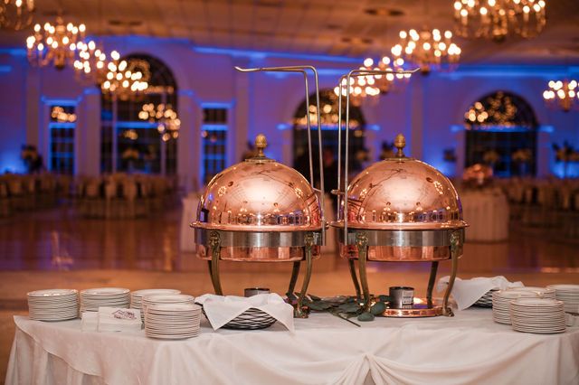 Silver serving dishes for catering buffet