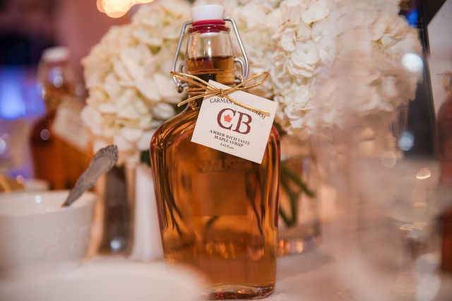 Table centerpiece with maple syrup bottle