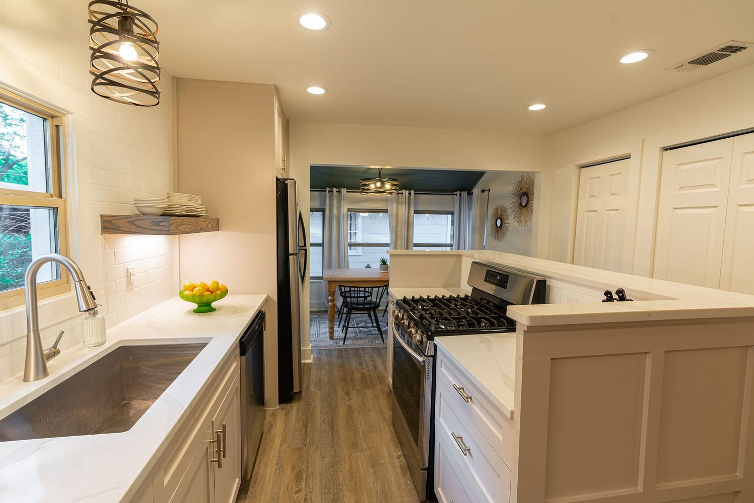 Remodeled kitchen with warm wood cabinetry