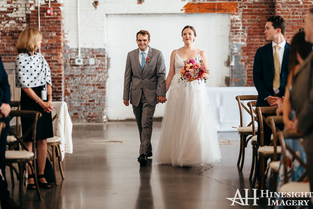 Bride walking down the aisle with her father