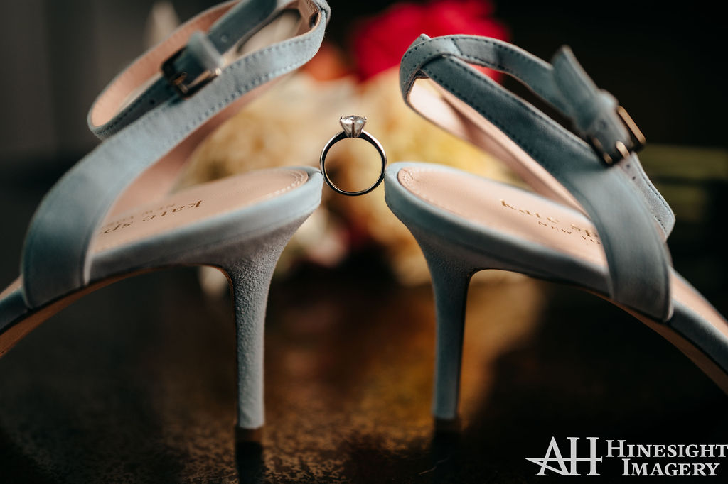 Blue wedding shoes with a ring