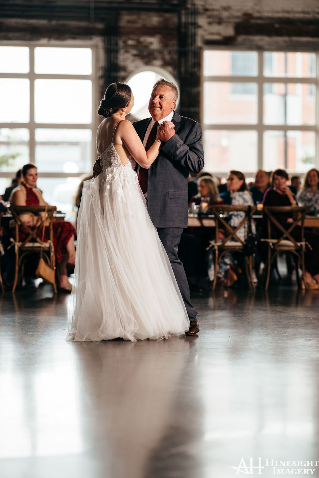 Bride dancing with her father on the dance floor