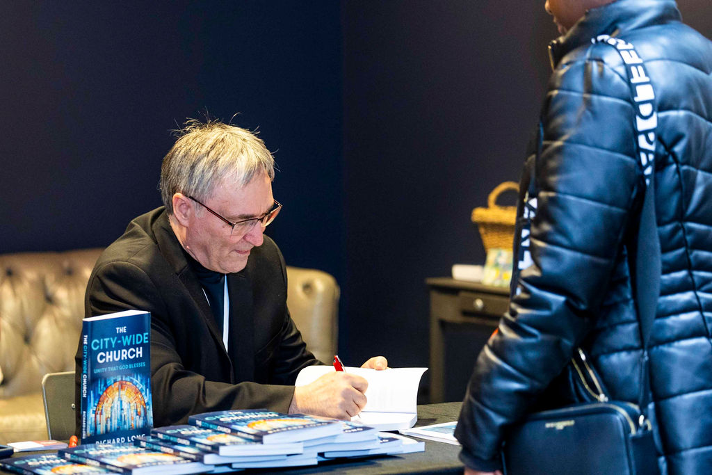 An author signing books