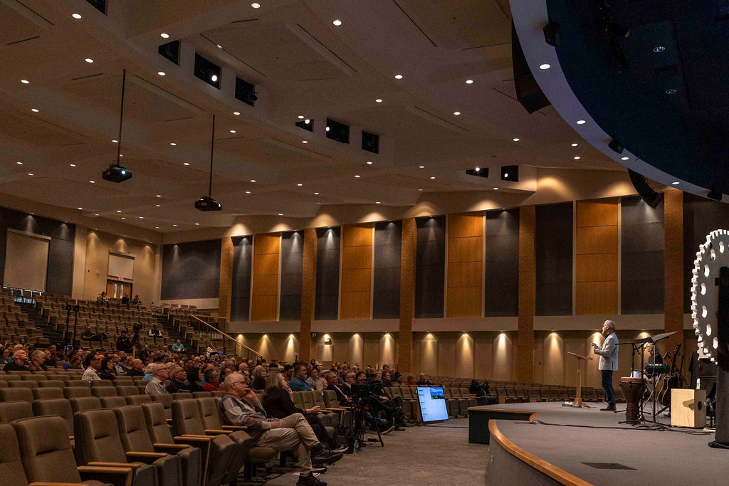 The auditorium full for the main session