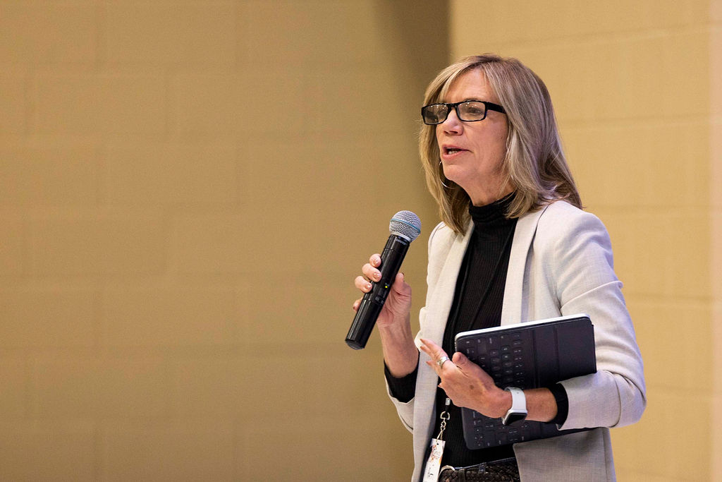 A speaker sharing with the room