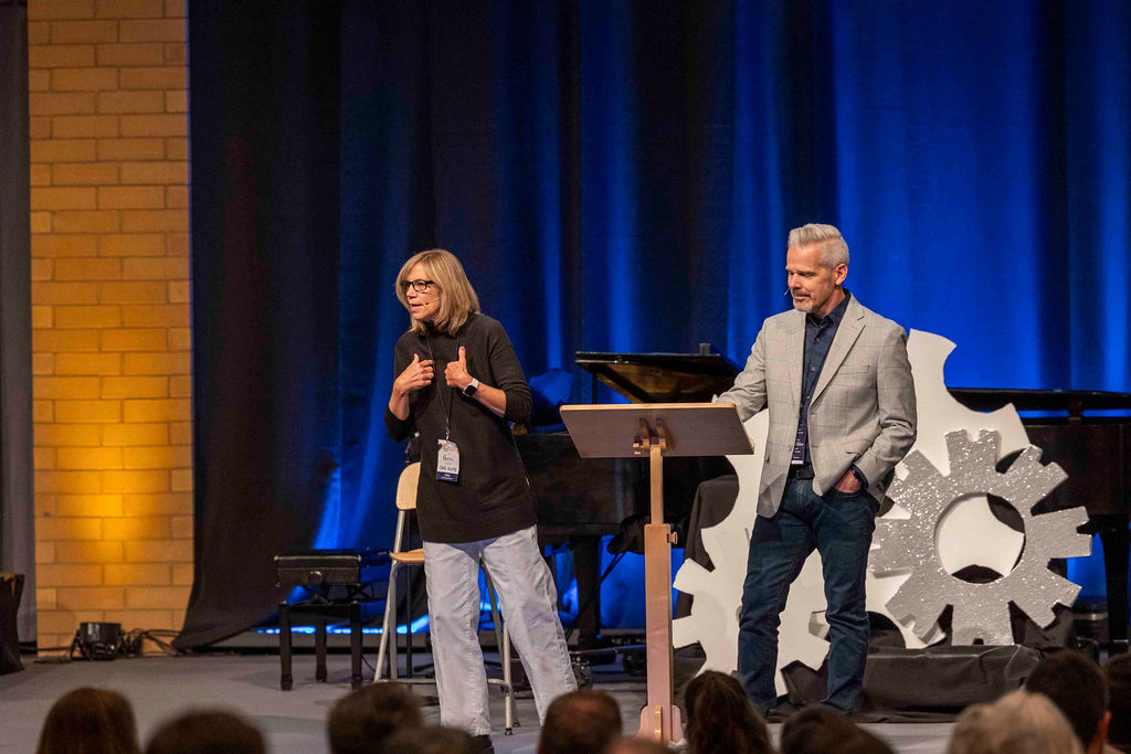 Two speakers on stage